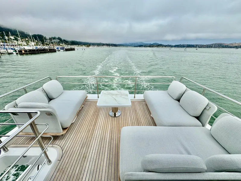 Slide: The Image of Luxurious 2024 Azimut Fly 60 yacht deck with elegant seating and ocean view. - 42