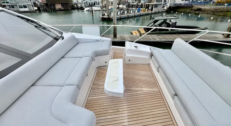 Slide: The Image of Luxurious 2024 Azimut Fly 60 yacht deck with elegant seating and waterfront view. - 47