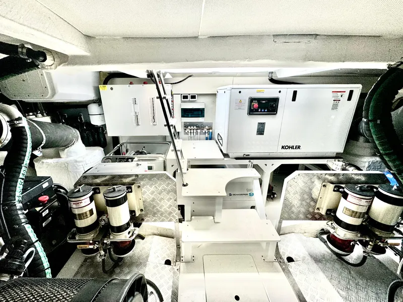 Slide: The Image of Engine room of 2024 Azimut Fly 60 yacht with Kohler generator and advanced systems. - 48