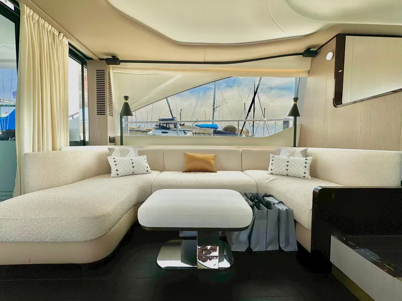 Slide: The Image of Luxurious interior of 2024 Azimut Fly 60 yacht with elegant seating and modern decor. - 5