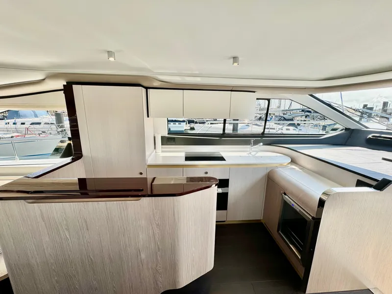 Slide: The Image of Luxurious interior of 2024 Azimut Fly 60 yacht with modern kitchen design. - 8