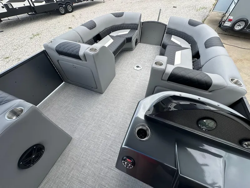 Slide: The Image of 2024 Massimo Marine P-21R pontoon boat interior with gray and black seating. - 11