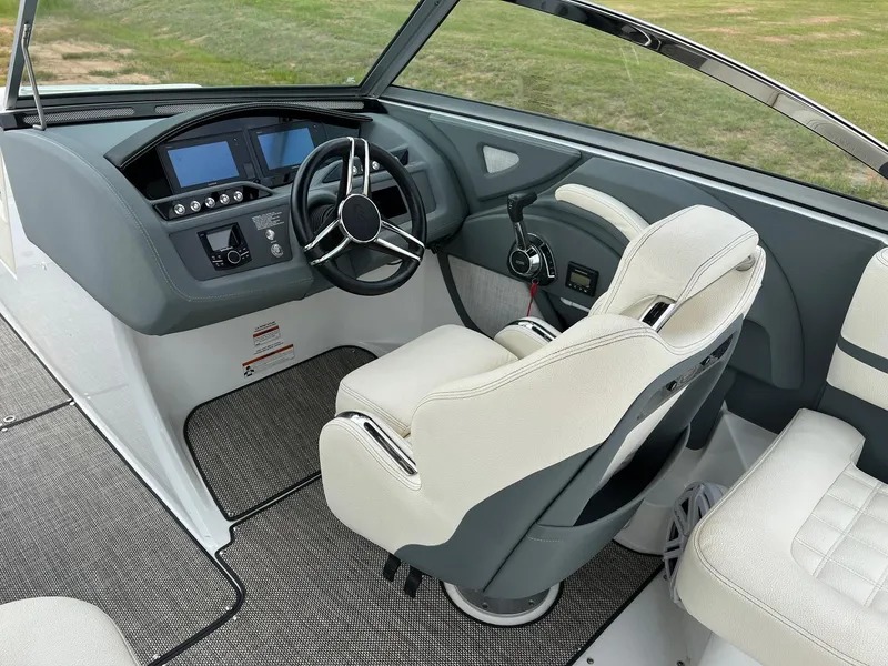 Slide: The Image of 2019 Cobalt R3 boat interior with steering wheel and dashboard. - 10