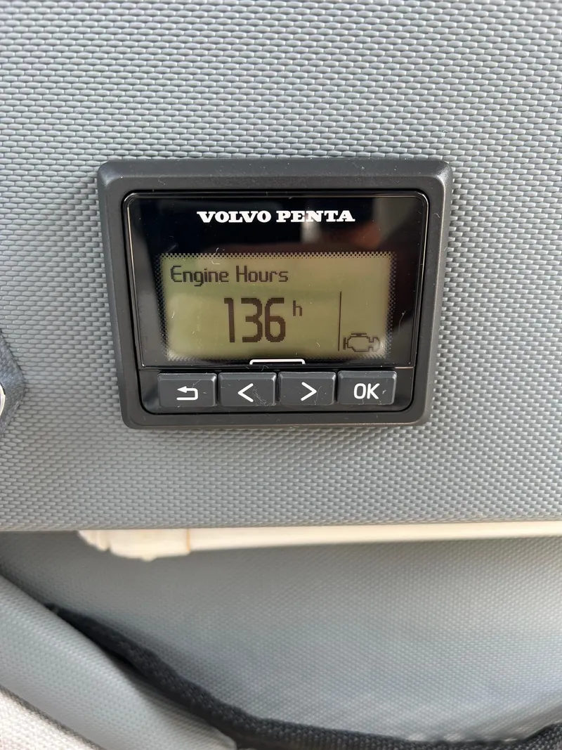 Slide: The Image of Volvo Penta engine hour meter showing 136 hours on a 2019 Cobalt R3 boat. - 12
