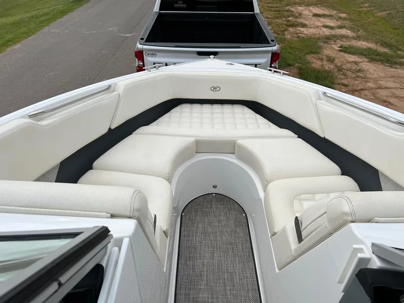 Slide: The Image of 2019 Cobalt R3 boat with white interior and cushioned seating. - 15