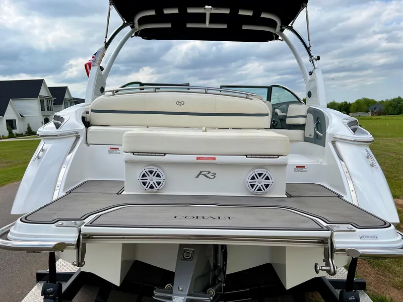Slide: The Image of 2019 Cobalt R3 boat rear view with swim platform and seating. - 6