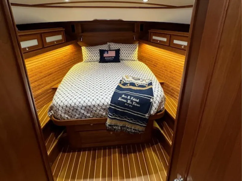 Slide: The Image of Luxurious cabin interior of 2017 Sabre 45 Salon Express yacht with cozy bedding. - 9