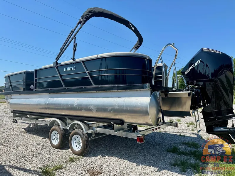 Slide: The Image of 2024 Massimo Marine P24-LTD QUAD pontoon boat on trailer with Mercury outboard motor. - 12