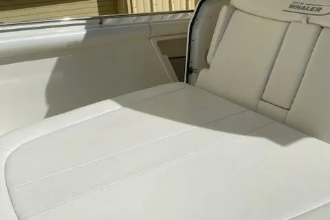 Slide: The Image of 2014 Boston Whaler 350 Outrage boat interior seating area. - 24
