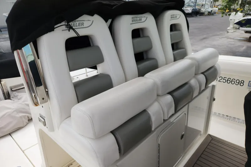 Slide: The Image of 2014 Boston Whaler 350 Outrage boat seats and console. - 30