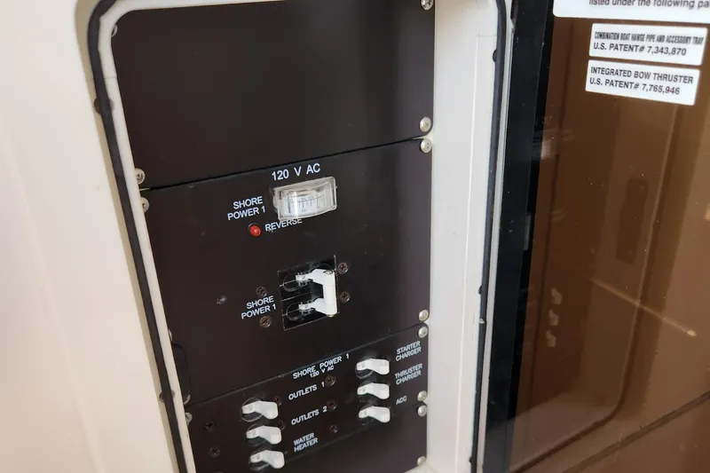 Slide: The Image of Control panel of a 2014 Boston Whaler 350 Outrage boat. - 48