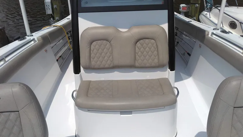 Slide: The Image of 2022 Sportsman Open 302 Center Console boat seating area. - 22