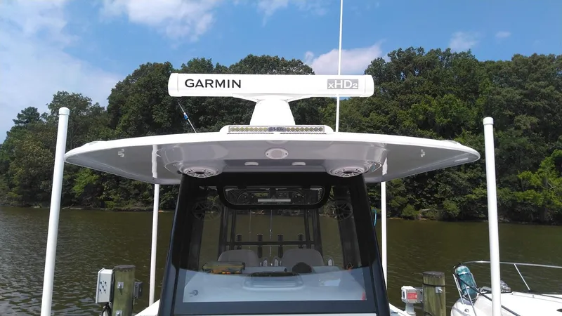 Slide: The Image of 2022 Sportsman Open 302 Center Console boat with Garmin xHD2 radar. - 24
