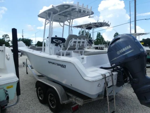 Slide: The Image of 2021 Sportsman Open 212 CC boat with Yamaha outboard motor on trailer. - 4