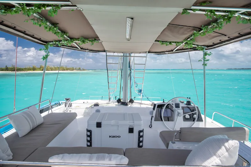 Slide: The Image of Luxurious Bali 4.8 catamaran interior with turquoise sea view, 2021 model. - 11