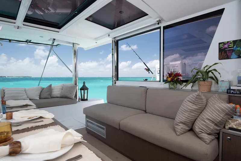 Slide: The Image of Luxurious interior of 2021 Bali 4.8 yacht with ocean view and elegant seating. - 16