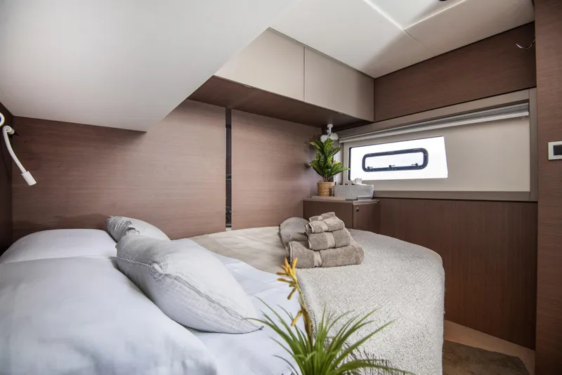 Slide: The Image of Luxurious cabin interior of 2021 Bali 4.8 yacht with cozy bedding and modern decor. - 30