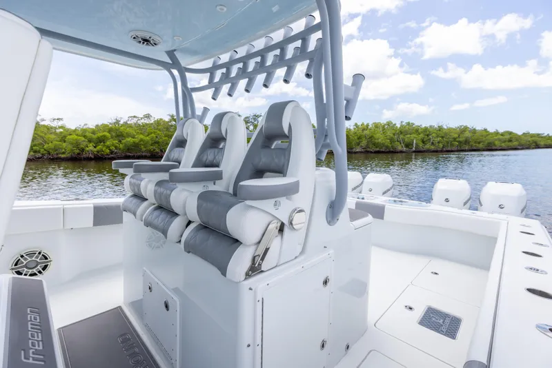 Slide: The Image of 2019 Freeman 42 LR boat interior with seating and rod holders. - 32