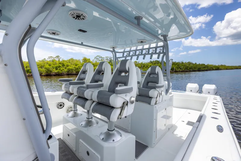 Slide: The Image of 2019 Freeman 42 LR boat interior with seating and rod holders. - 34