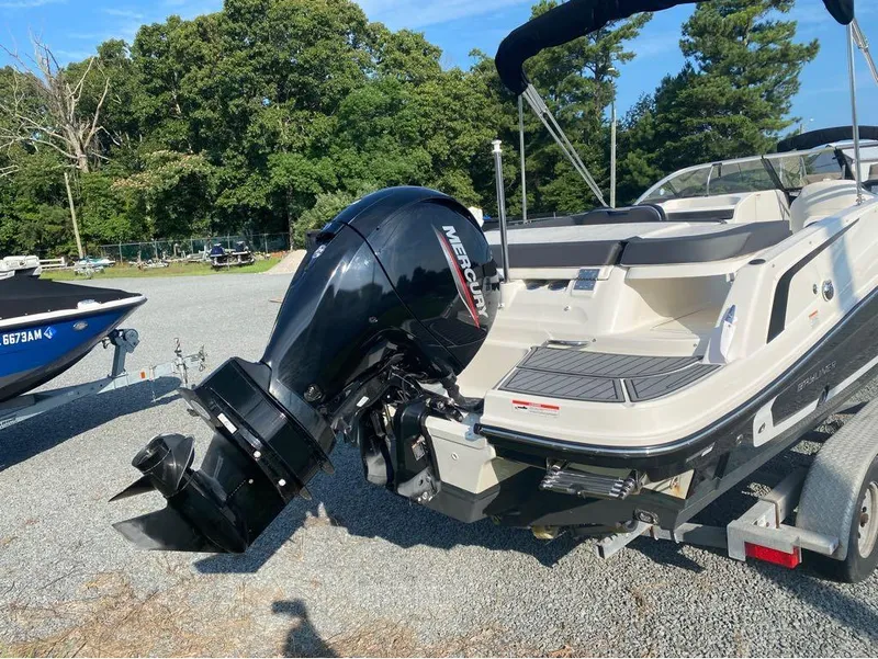 Slide: The Image of 2021 Bayliner VR6 Bowrider with Mercury outboard motor on trailer. - 6