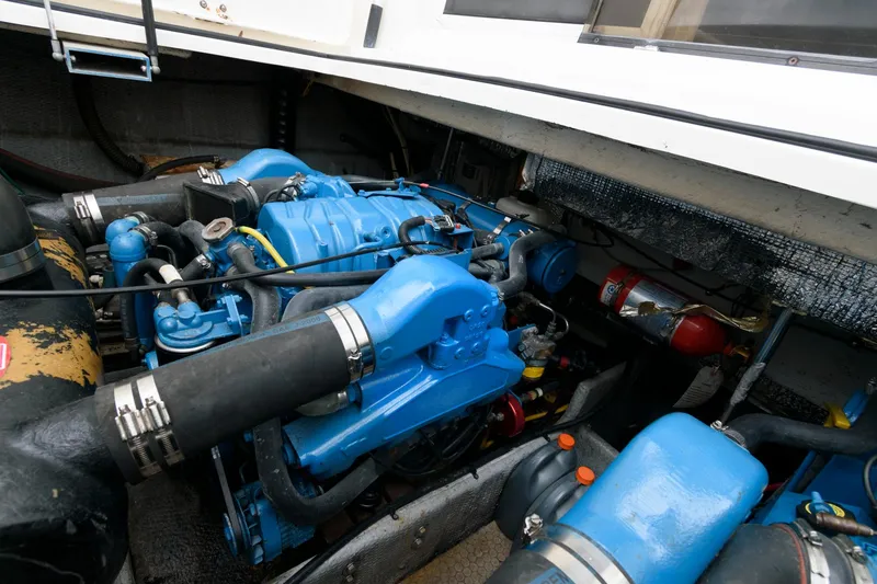 Slide: The Image of Engine compartment of a 2000 Silverton 330 Sport Bridge boat. - 19