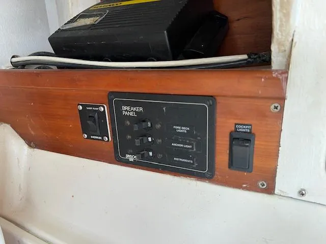 Slide: The Image of Breaker panel on a 1999 Contour 34 SC boat. - 26