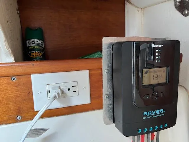 Slide: The Image of Renogy Rover MPPT charge controller in 1999 Contour 34 SC boat cabin. - 31