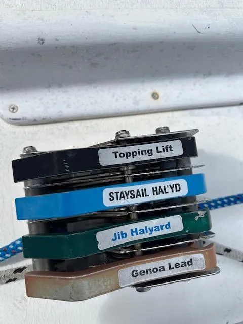 Slide: The Image of Close-up of labeled sailboat rigging lines on a 1999 Contour 34 SC. - 35