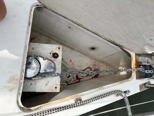 Slide: The Image of Anchor chain compartment of a 1999 Contour 34 SC sailboat. - 37