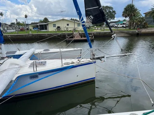 Slide: The Image of 1999 Contour 34 SC sailboat docked in a calm marina. - 4