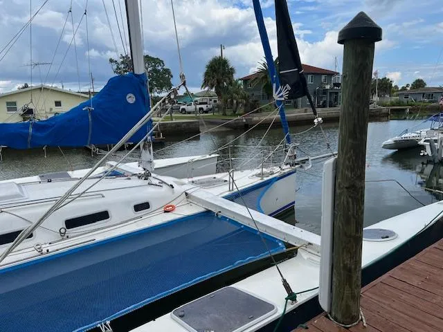 Slide: The Image of 1999 Contour 34 SC sailboat docked at a marina. - 5
