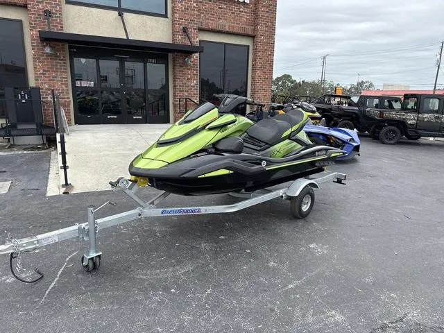 Slide: The Image of 2024 Yamaha Marine Waverunner FX Cruiser SVHO with audio on trailer, parked outside a building. - 4