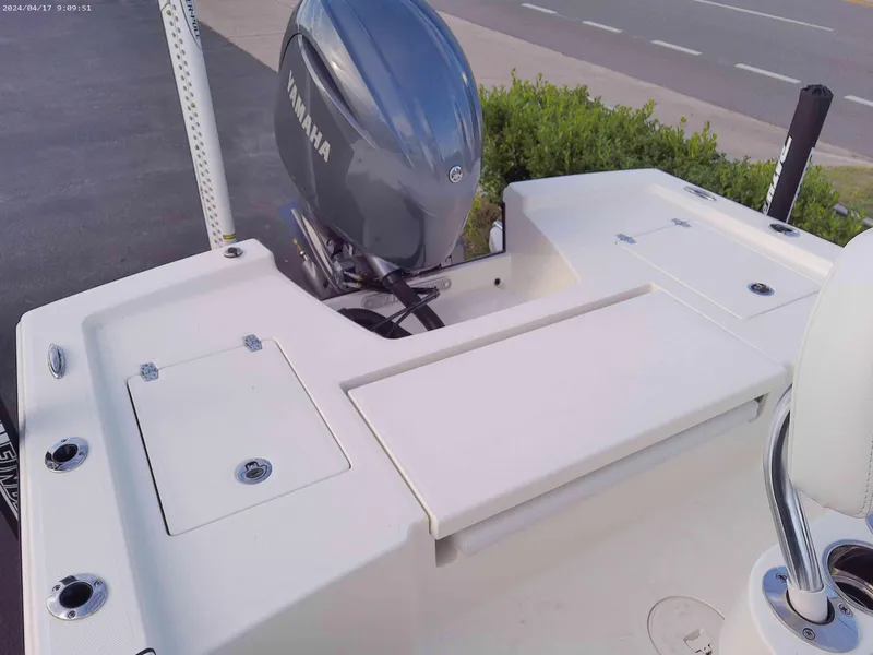 Slide: The Image of 2025 Pathfinder 2200 TRS boat with Yamaha outboard motor, rear deck view. - 7
