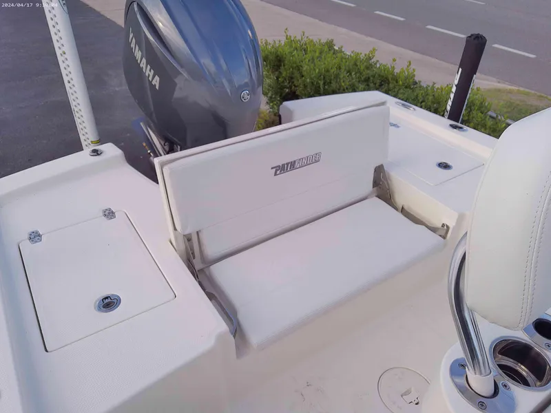 Slide: The Image of 2025 Pathfinder 2200 TRS boat with Yamaha outboard motor and white seating. - 8