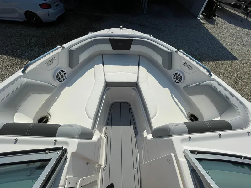 Slide: The Image of 2024 Chaparral 21 SSi OB boat interior, featuring spacious seating and modern design. - 12