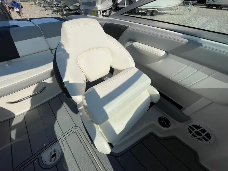 Slide: The Image of 2024 Chaparral 21 SSi OB boat interior with white seating and modern design. - 27