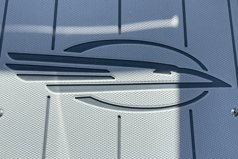 Slide: The Image of 2024 Chaparral 21 SSi OB boat deck with logo. - 28