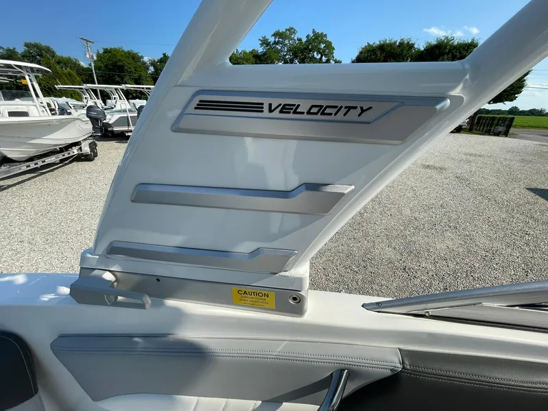 Slide: The Image of 2024 Chaparral 21 SSi OB boat interior with Velocity branding. - 33