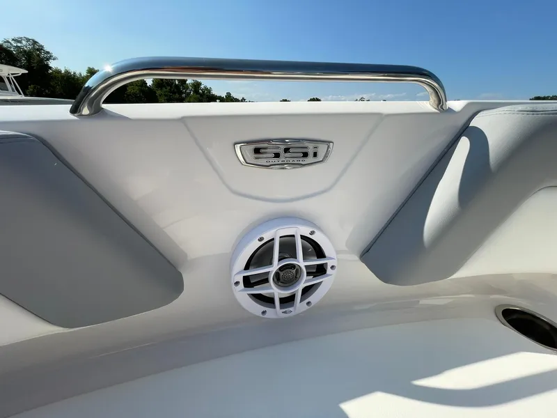 Slide: The Image of 2024 Chaparral 21 SSi OB boat interior with speaker and 21 SSi emblem. - 9