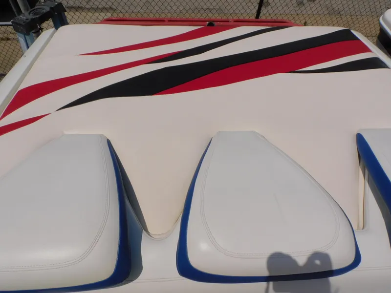 Slide: The Image of 2007 Baja Outlaw 35 boat with red, black, and white upholstery design. - 34