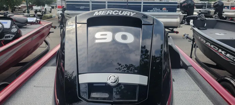 Slide: The Image of 2024 Tracker Pro Team 190 TX with Mercury 90 engine, displayed in a showroom. - 4