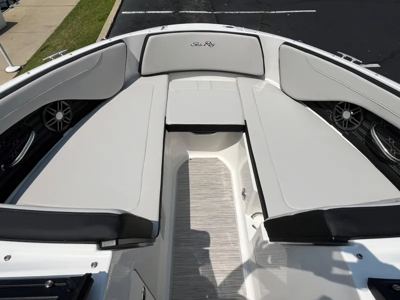 Slide: The Image of 2025 Sea Ray SPX 190 boat interior with white and black seating. - 7