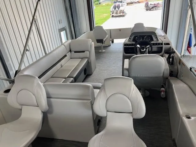 Slide: The Image of Interior of 2025 Godfrey Sweetwater 2286 F pontoon boat with white seating. - 14