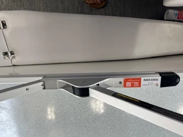 Slide: The Image of 2025 Godfrey Sweetwater 2286 F boat interior detail with Power Bimini mechanism. - 15