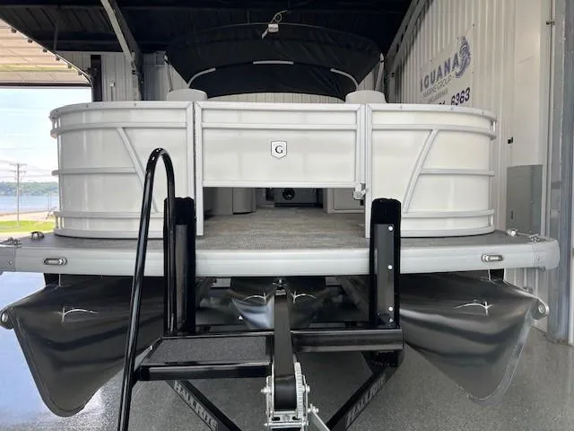 Slide: The Image of 2025 Godfrey Sweetwater 2286 F pontoon boat on trailer in storage facility. - 3