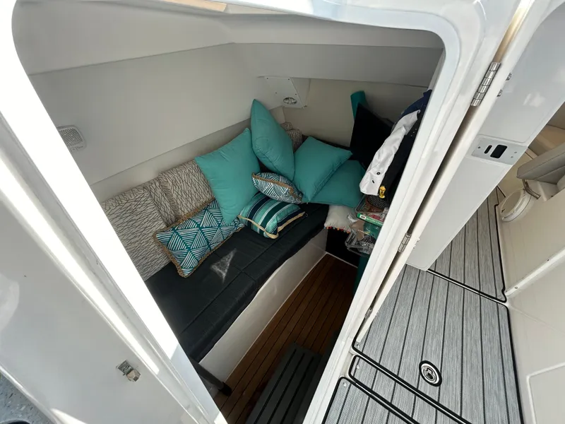 Slide: The Image of Cozy cabin interior of 2019 Everglades 340DC with cushions and modern decor. - 14
