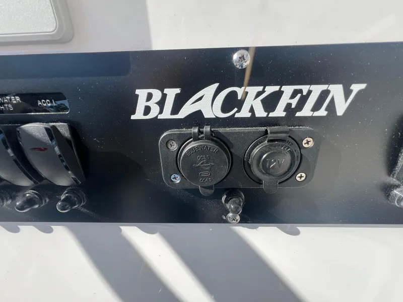 Slide: The Image of Close-up of 2025 Blackfin 222 CC control panel. - 19