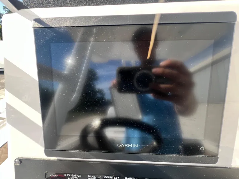 Slide: The Image of Garmin display on 2025 Blackfin 222 CC boat dashboard. - 23