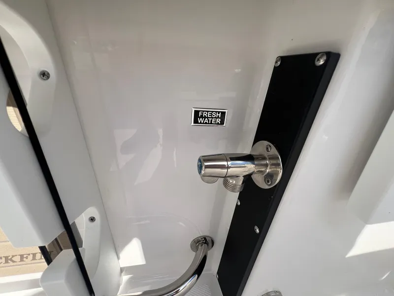 Slide: The Image of Fresh water outlet on 2025 Blackfin 222 CC boat. - 26