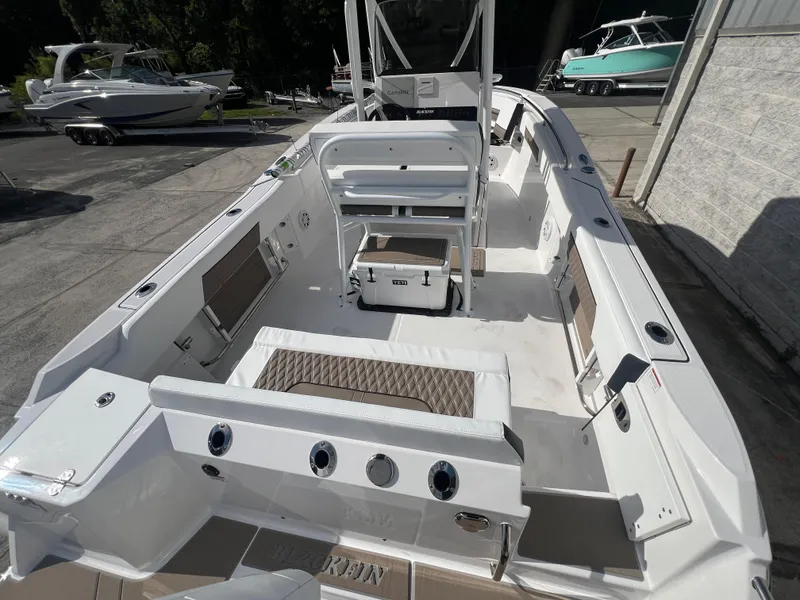 Slide: The Image of 2025 Blackfin 222 CC center console boat with spacious deck and seating. - 3